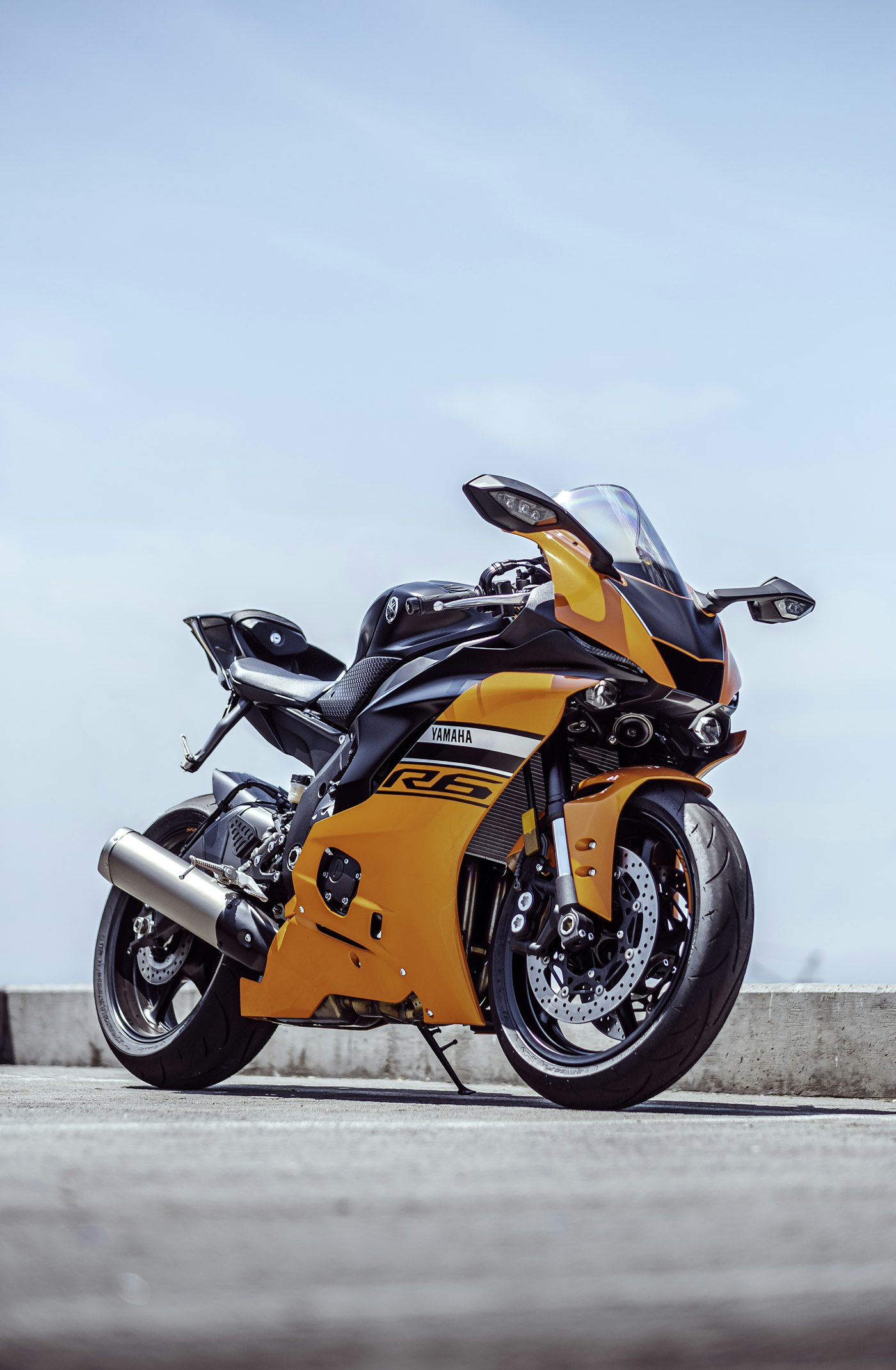 Orange sport bike from low angle